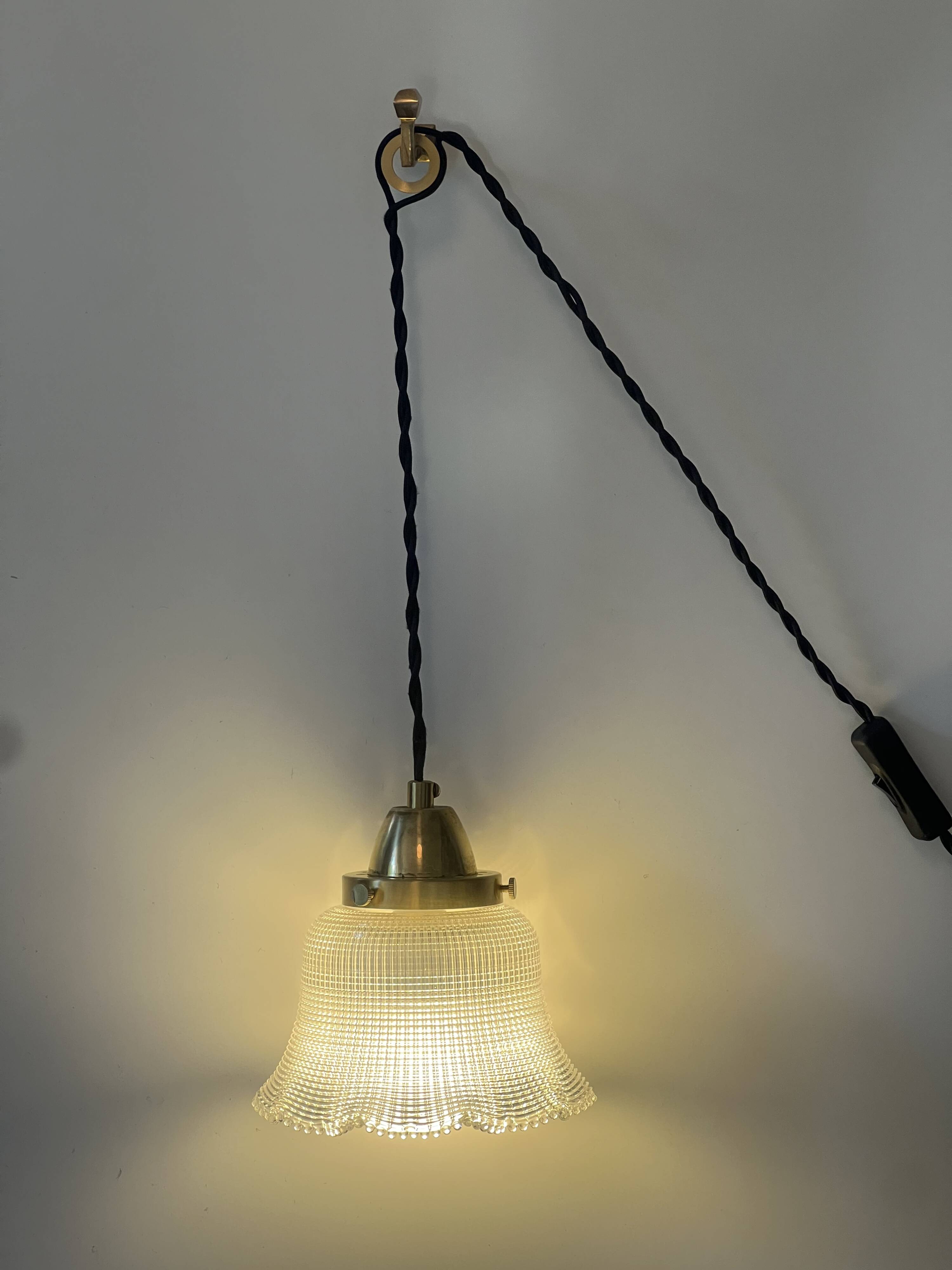 Industrial Holophane glass portable lamp with brass hook