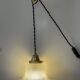 Industrial Holophane glass portable lamp with brass hook