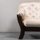 Fauteuil en tissu beige 70s vintage moderne