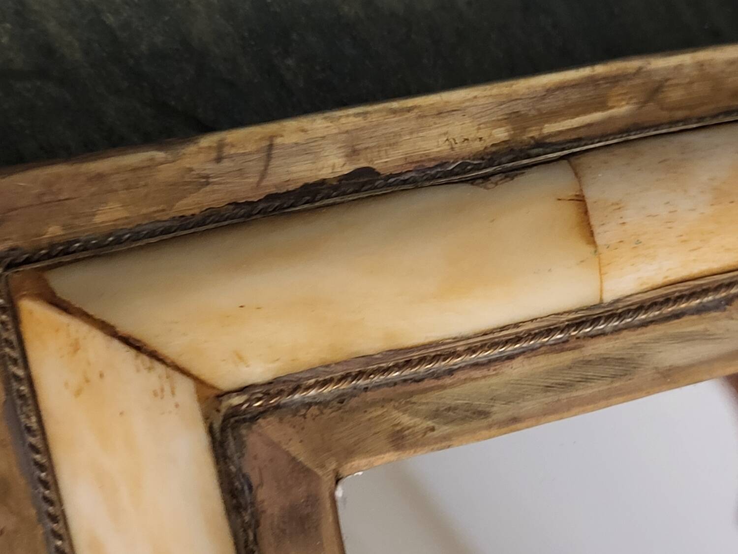 Brass and bone mirror