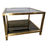 Table basse en métal doré et verre fumé