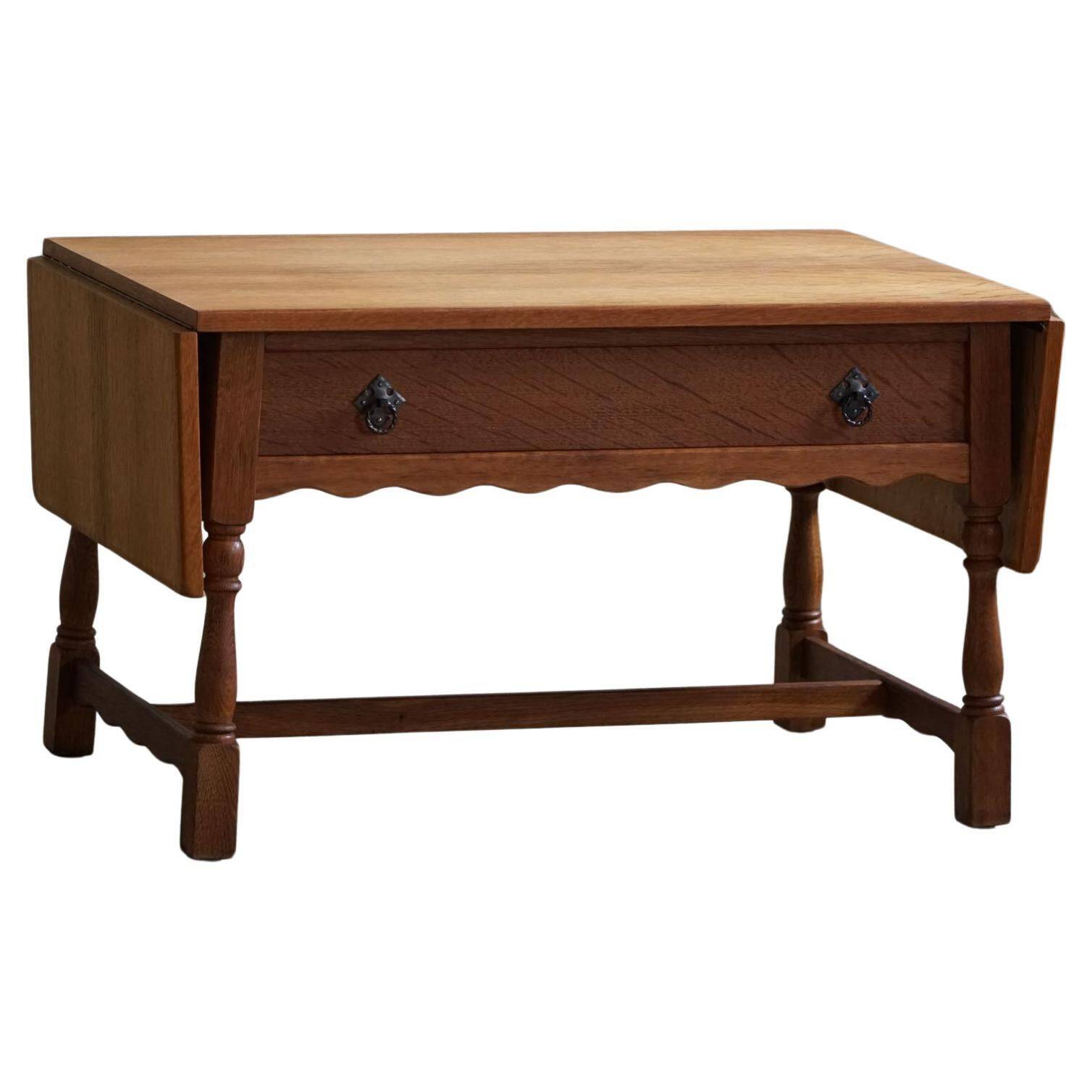 Danish folding table from the mid-century with a drawer in oak, Henning Kjærnulf, 1960s.