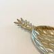 Empty pineapple pocket in silver metal