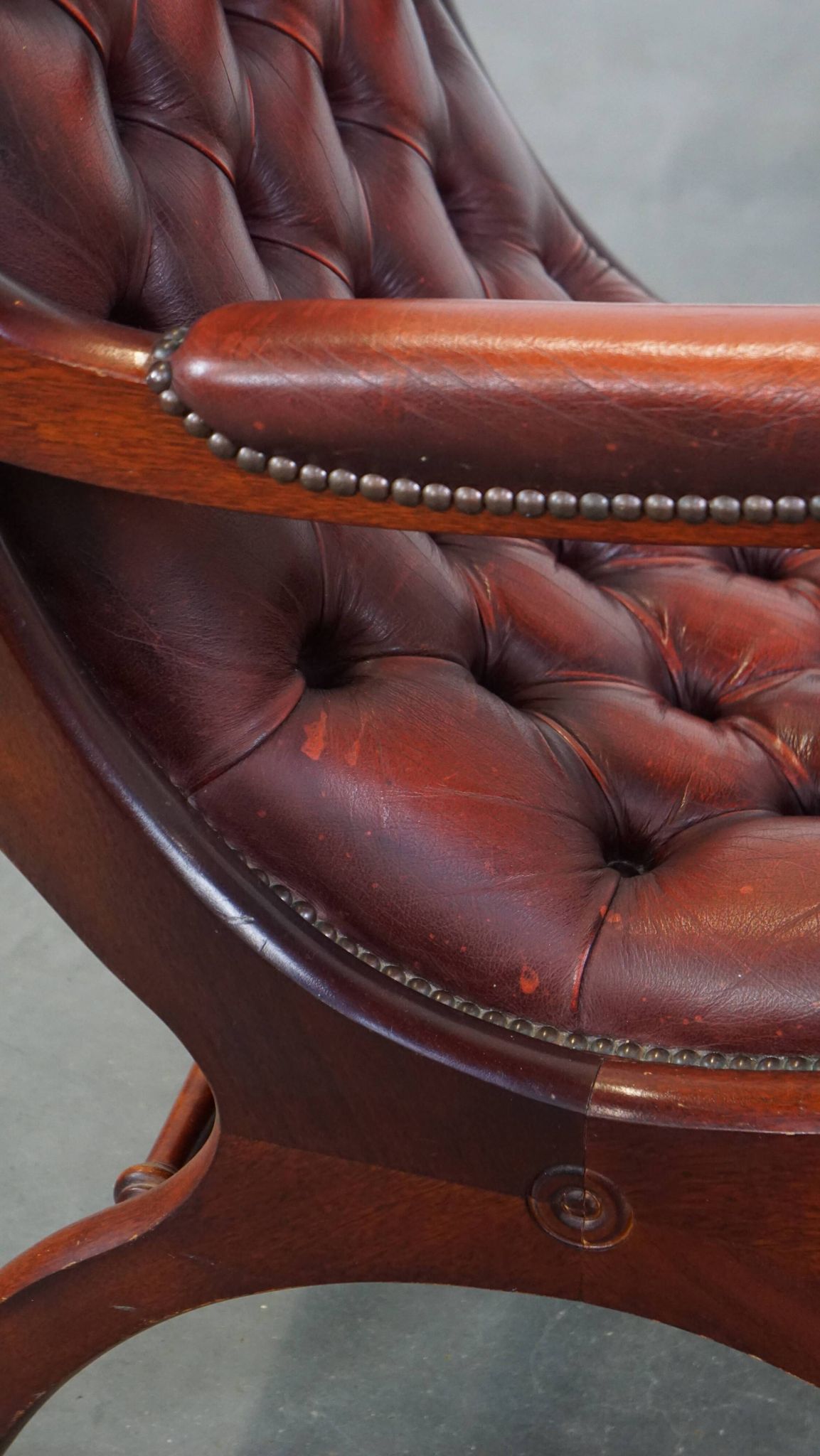 Red cowhide leather English Chesterfield armchair combined with wood