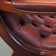 Red cowhide leather English Chesterfield armchair combined with wood
