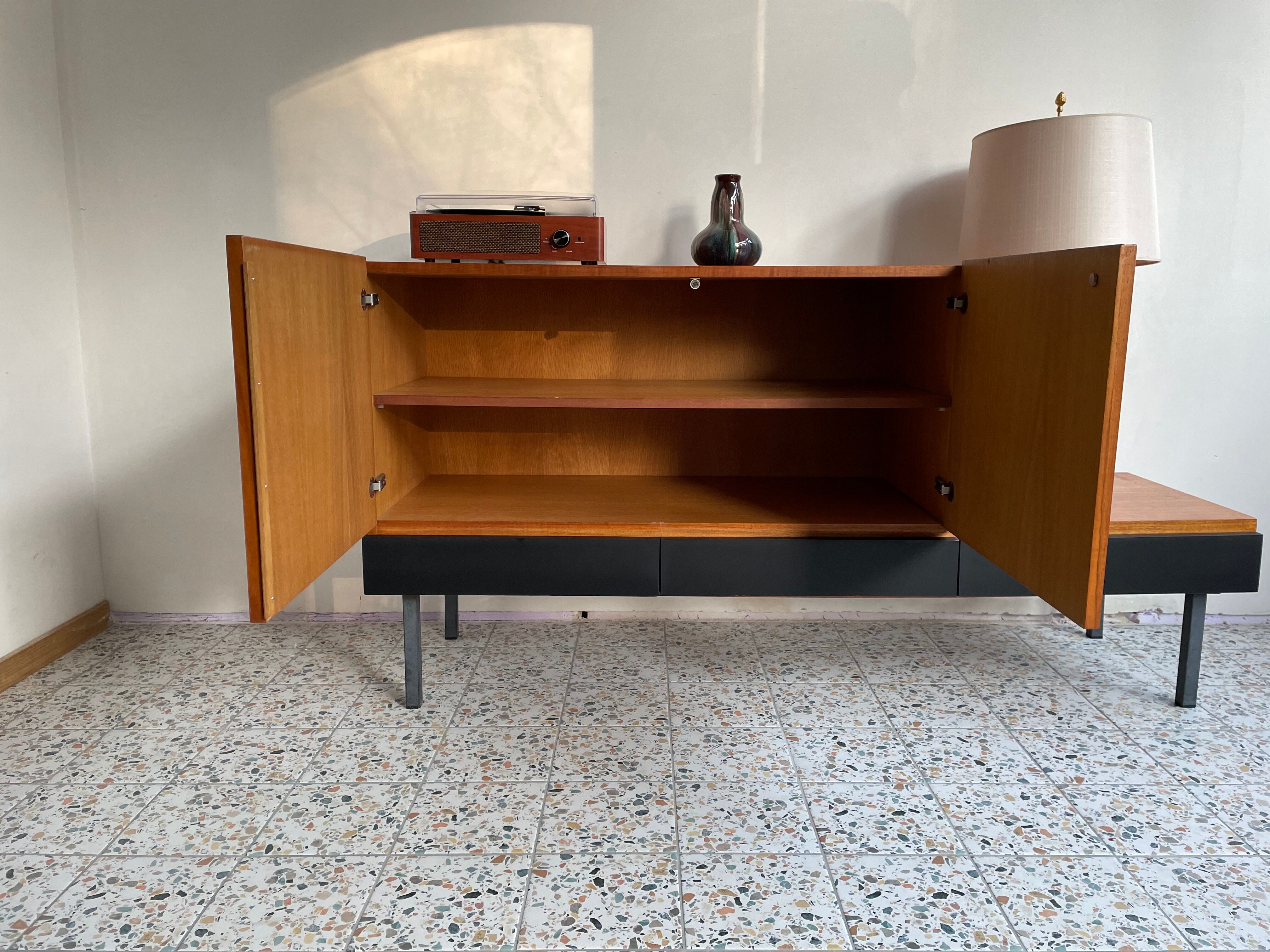 Asymmetrical vintage teak row