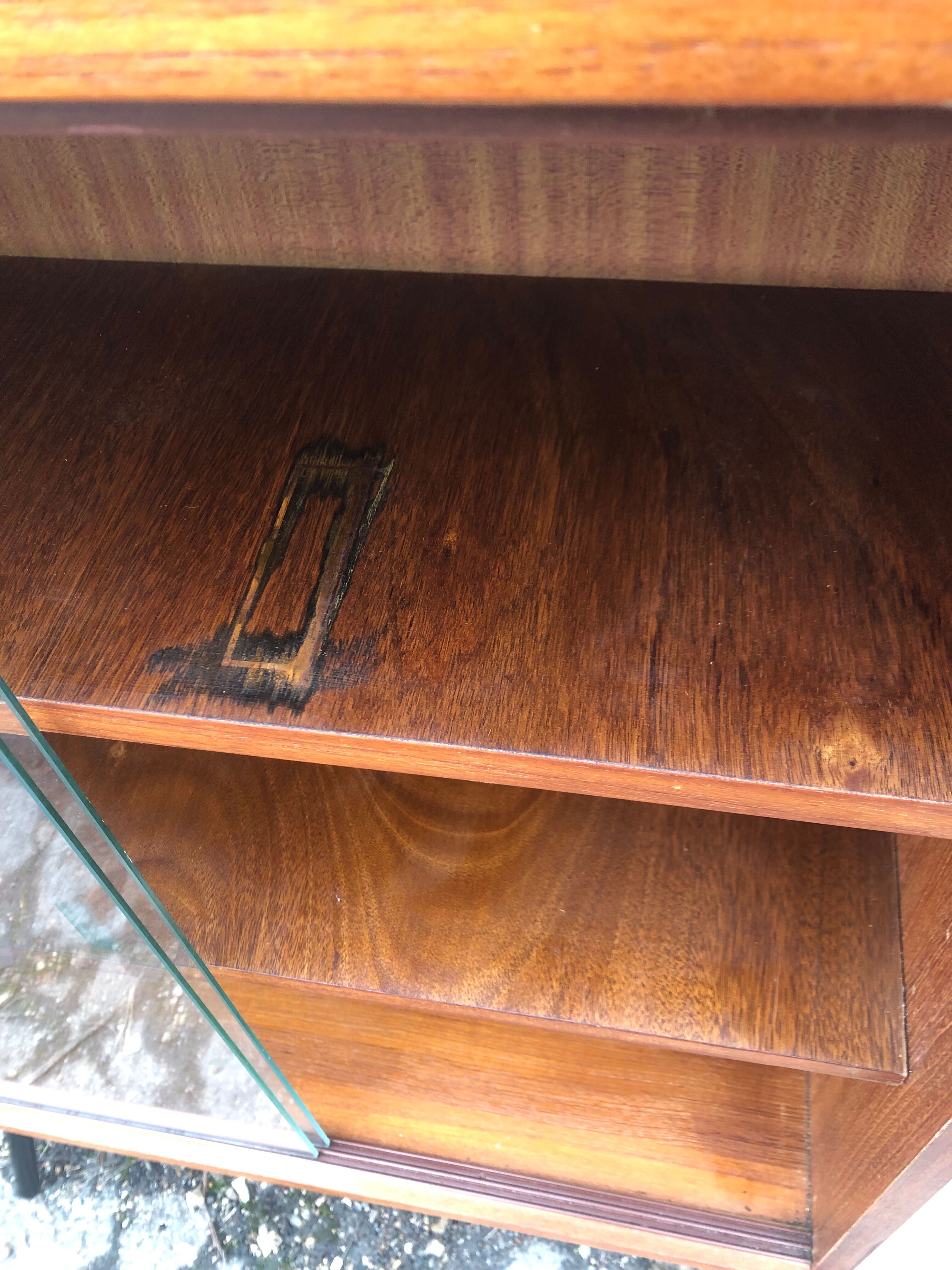 Vintage library showcase with 60s sliding doors