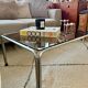 Ancienne table basse chrome et verre fumé vintage