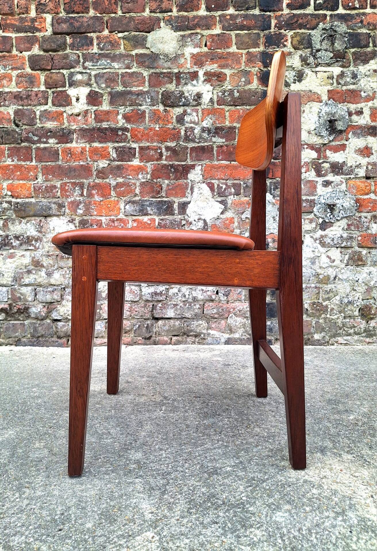 Vintage Scandinavian chair in teak, antique seating furniture.