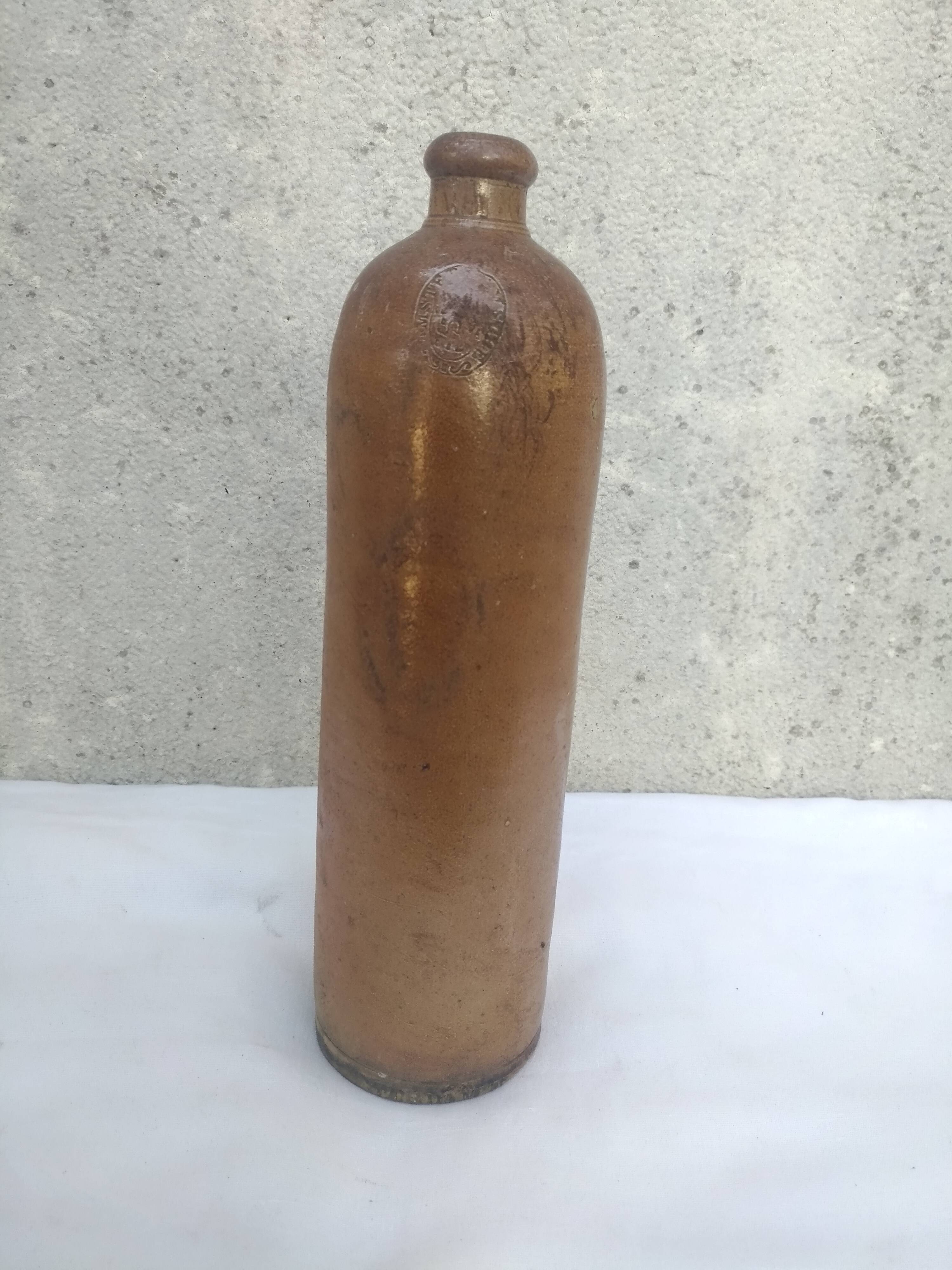 Bottle in sandstone