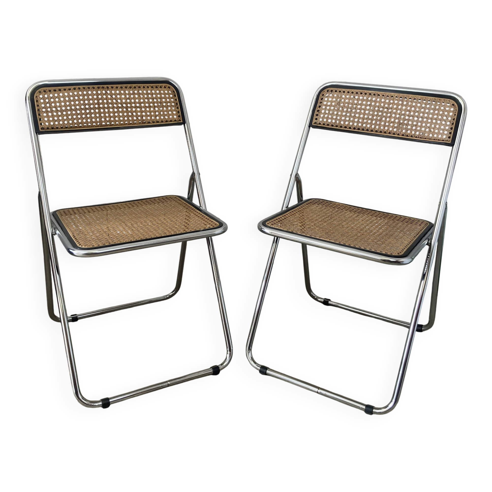 Pair of chrome and cane folding chairs