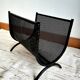 Cast iron magazine rack, circa 1950
