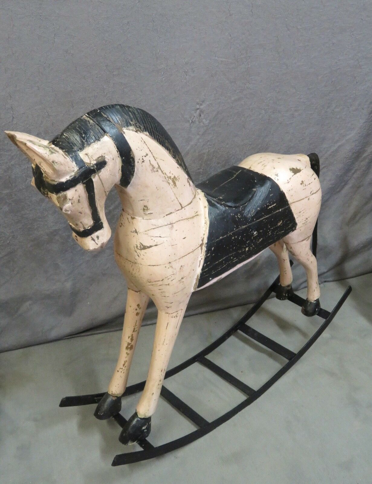 Powder pink and black rocking wooden horse