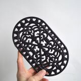 Black cast iron trivet