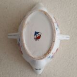 Lean fat sausage in Limoges porcelain