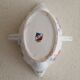 Lean fat sausage in Limoges porcelain