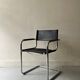 Chrome and black leather armchair