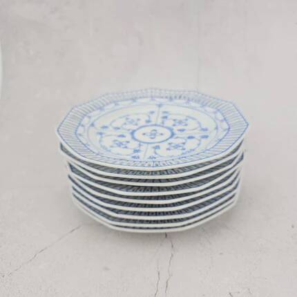 Set of 8 pierced dessert plates in Schumann porcelain.