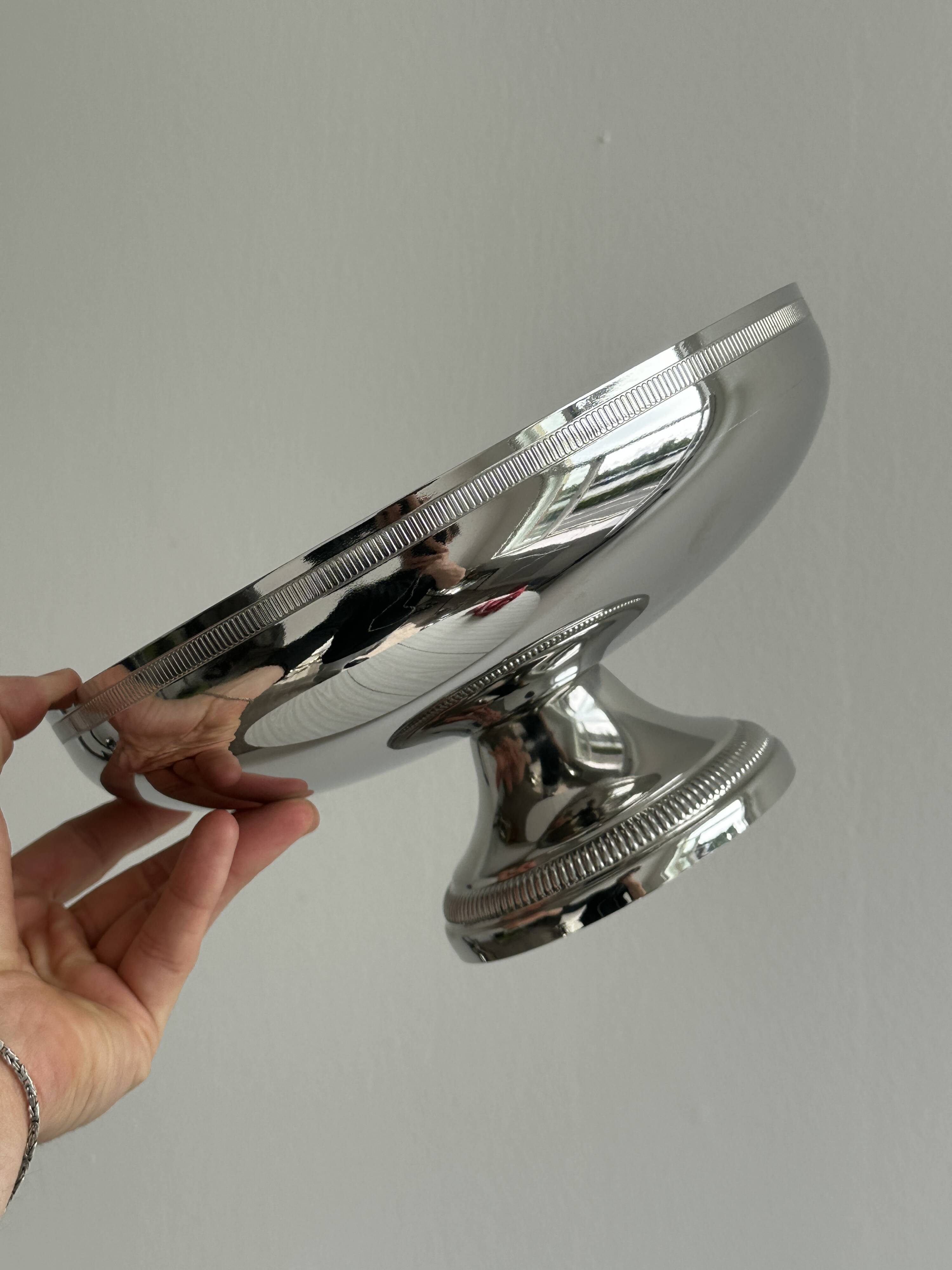 Large silver stainless steel pedestal bowl