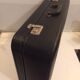 Antique vintage black upholstered vintage suitcase
