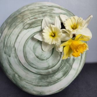 Vintage glazed ceramic vase in the shape of a snail