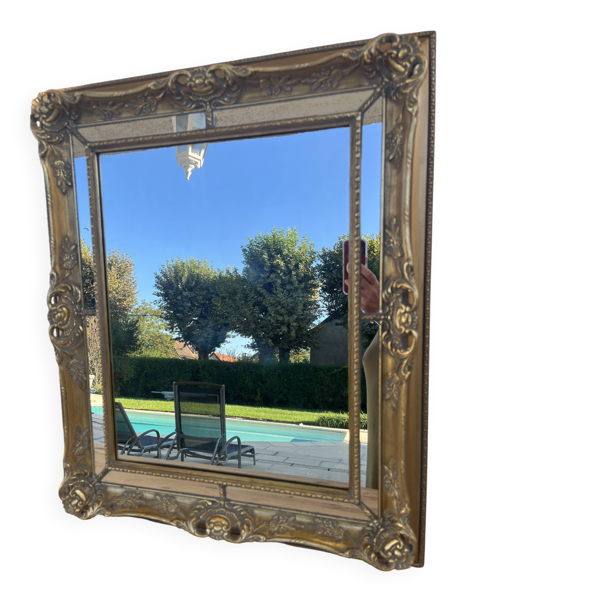 Golden mirror with a closed pore.