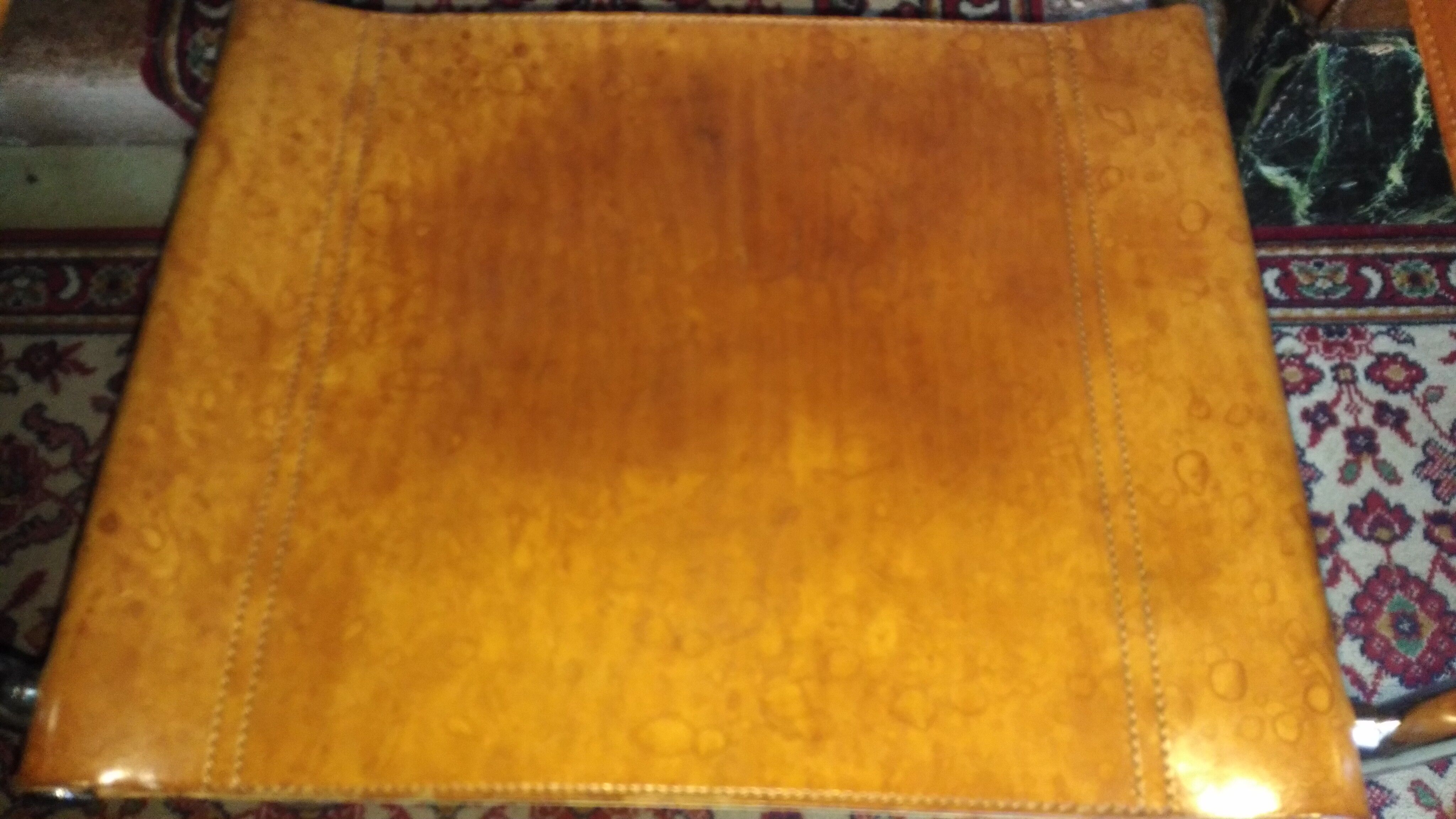 Three  leather armchairs