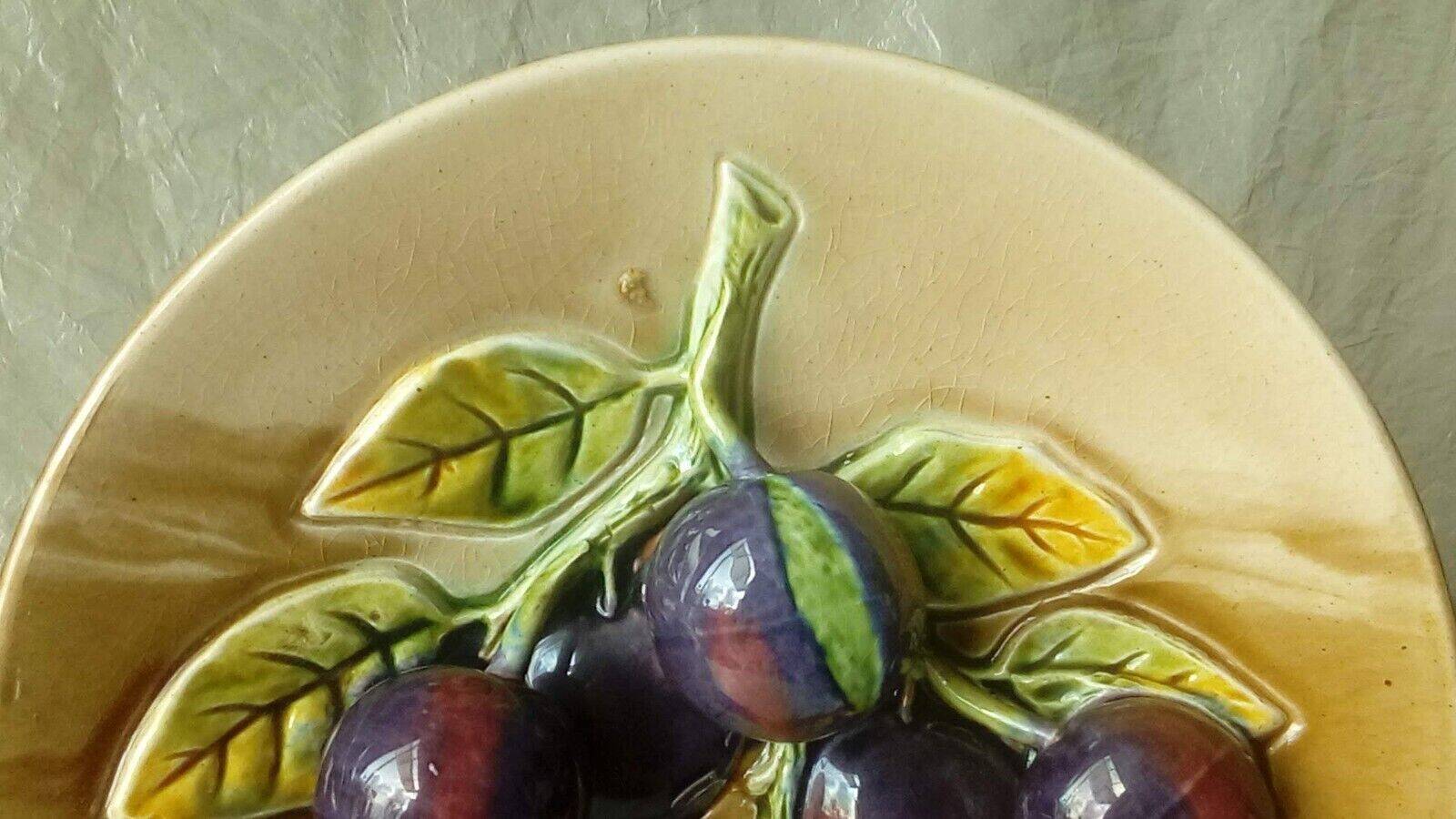 Ceramic plate barbotine trome eye plum late 19th