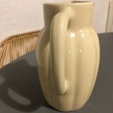 Cream color earthenware pitcher