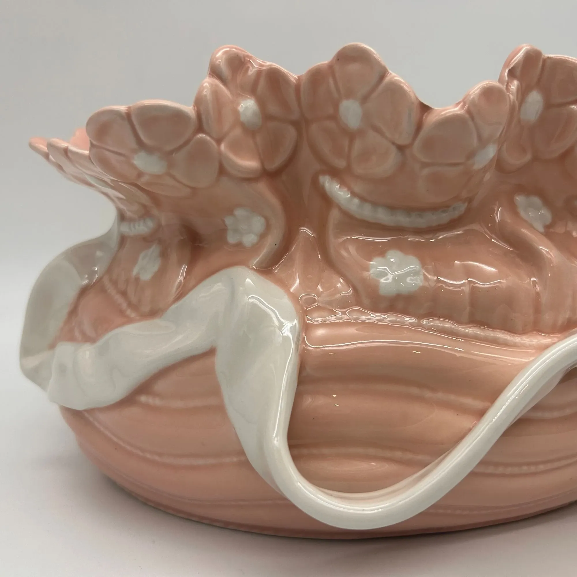 Vintage ceramic cache-pot in pink and white.