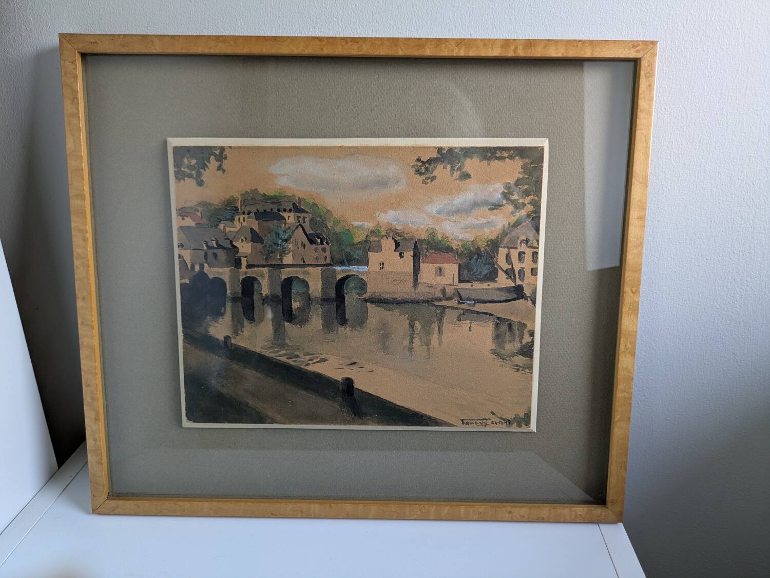 Watercolour signed 1949 framed with a magnifying glass.