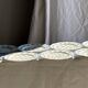Set of 10 flat plates in Limoges porcelain from France with flowers.