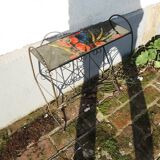 Ancien porte-revue en fer forgé et céramique