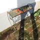 Antique wrought iron and ceramic magazine rack