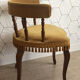 Vintage fringed gondola armchair