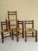 Set of four straw-seated farmhouse chairs.