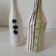 Duo de vases en céramique émaillée, décor pictural, signés MU
