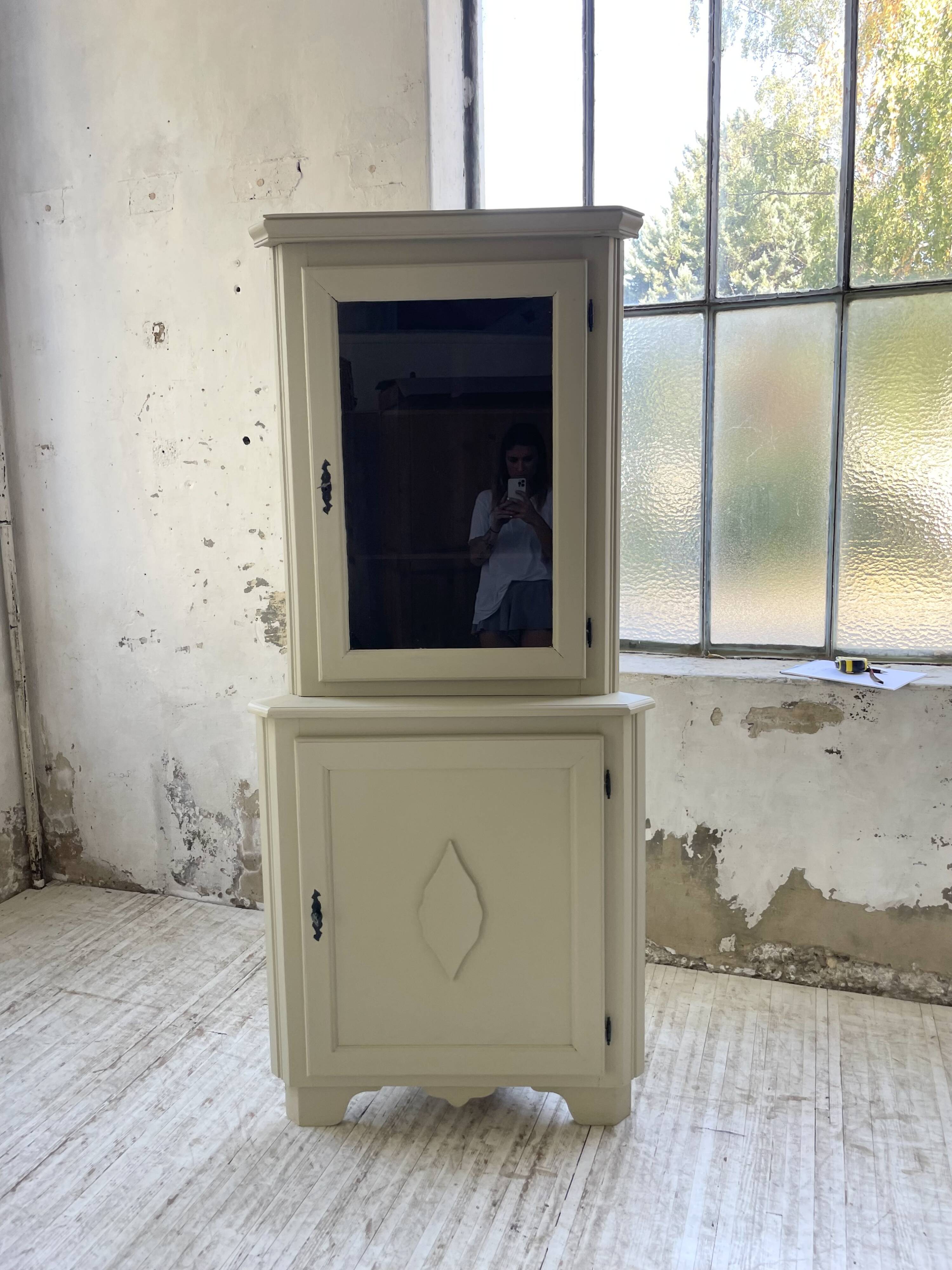 Corner display cabinet from the 1950s