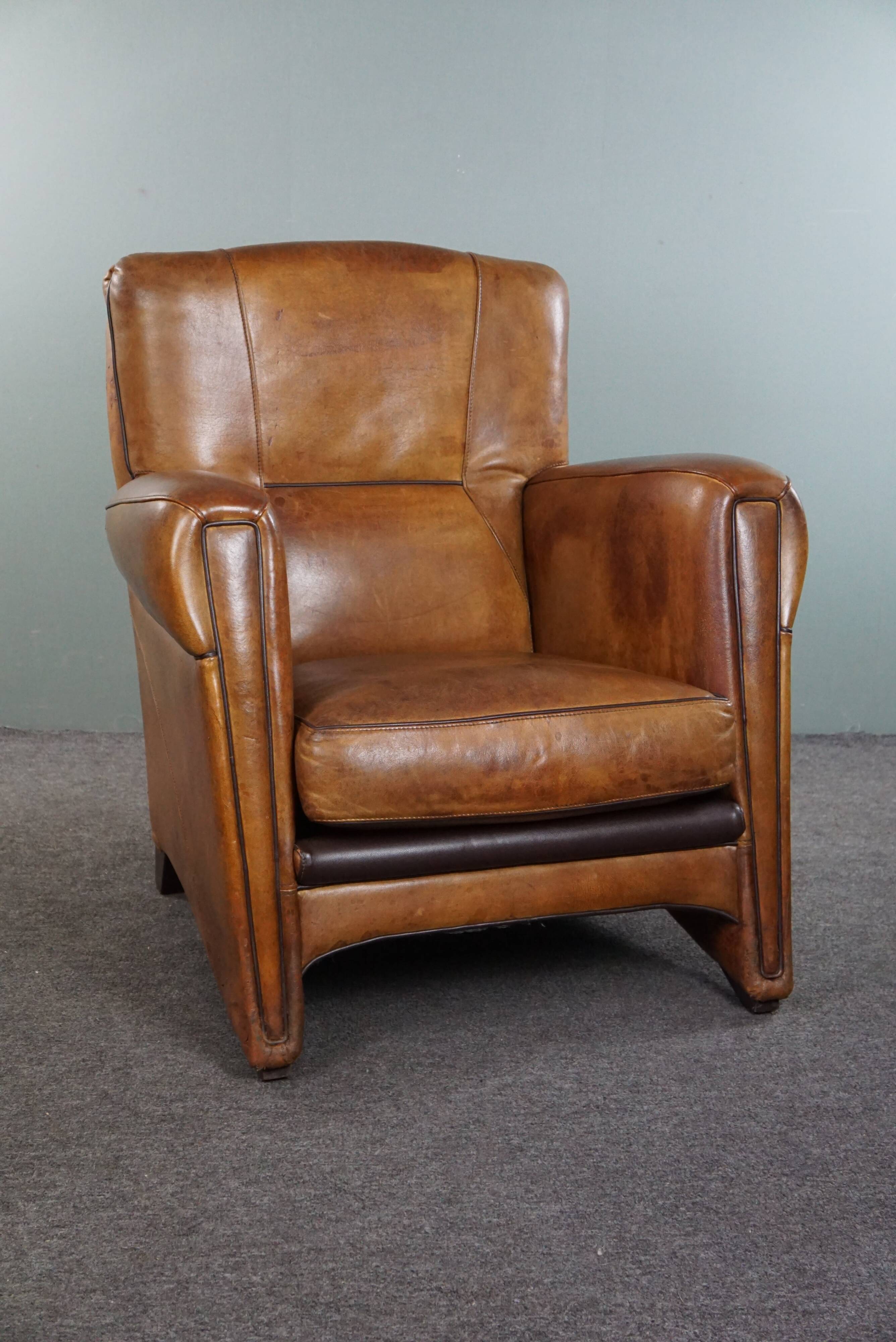 Striking modern design armchair made of high-quality sheepskin leather