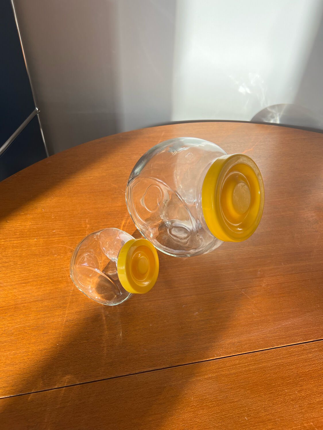 Pair of yellow vintage candy jars