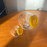 Pair of yellow vintage candy jars