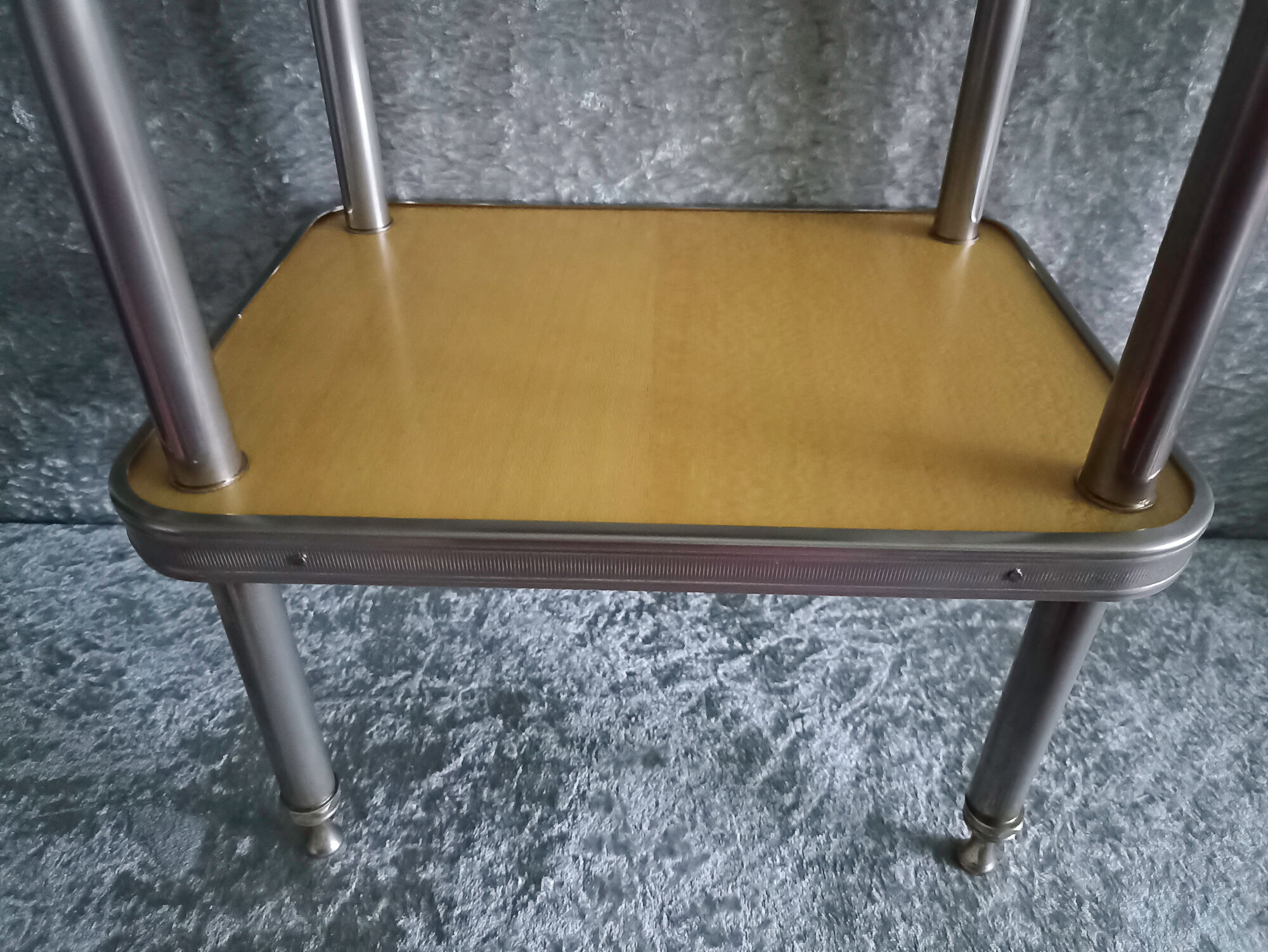 Side table in stainless steel and formica