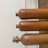 Trio of old sandstone bottles