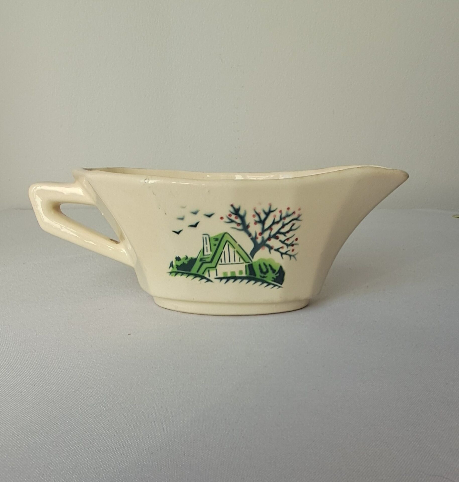 Bayeux model sauce boat from Digoin Sarreguemines. Vintage.