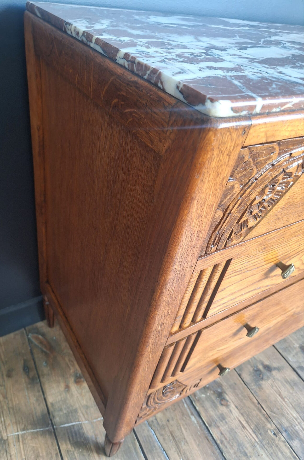 Art Deco commode with marble top, vintage antique furniture.