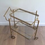 Neoclassical style rolling table in brass