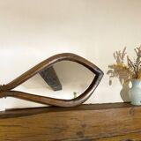 Mirror with fish-shaped wooden frame