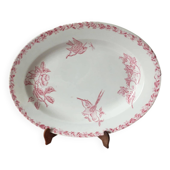 Oval-shaped dish decorated with birds and flowers in Onnaing earthenware signed intaglio