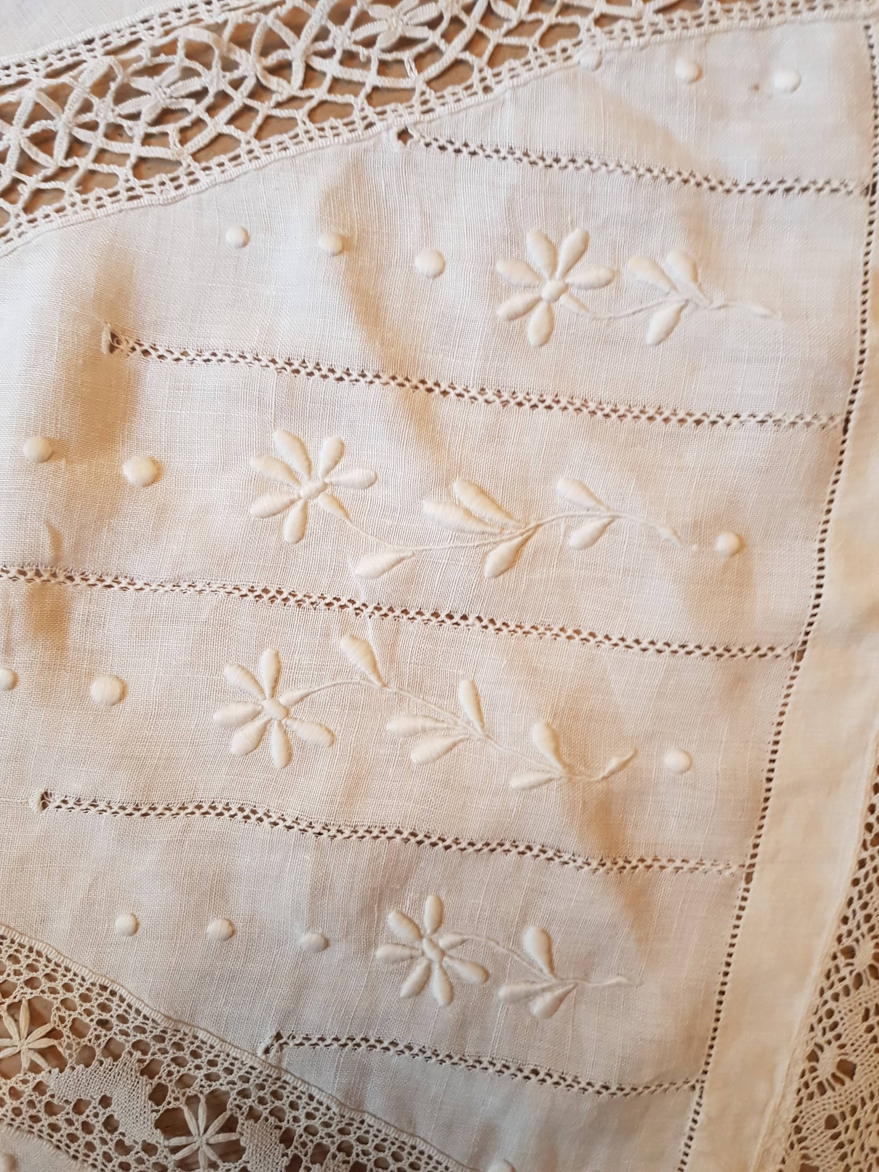 Round hand-embroidered linen tablecloth