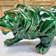 Art Deco lion statue cracked St Clement